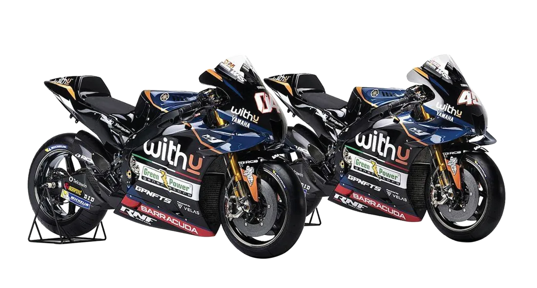 Dos motos de competición azules y negras